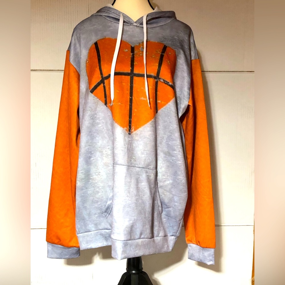 Heart shaped basket ball on a hoodie. Women’s XL